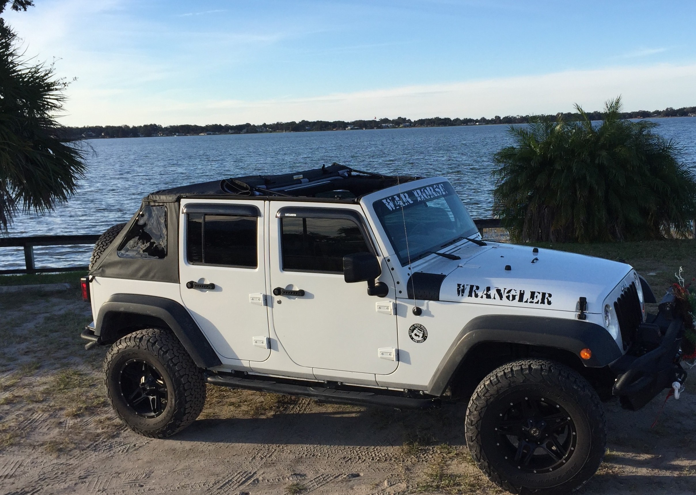 What Are the Pros and Cons of Framed vs Frameless Jeep JK Soft Tops?