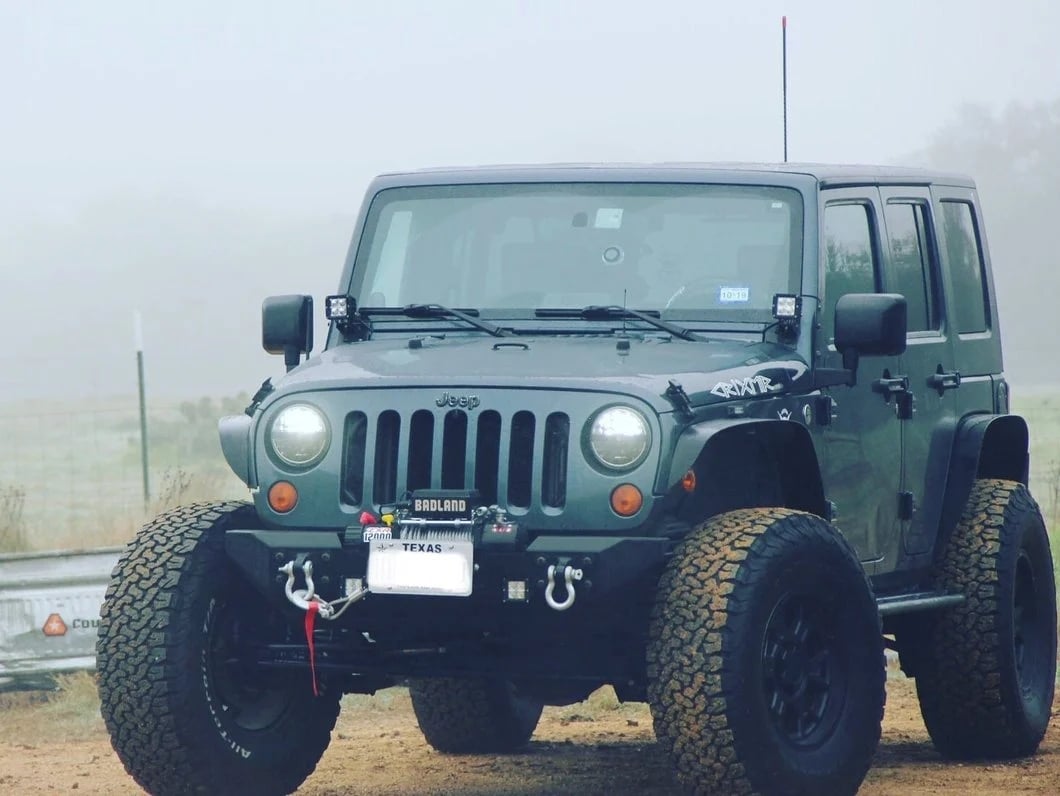 Jeep Wrangler with aftermarket lift kit and larger off-road tires