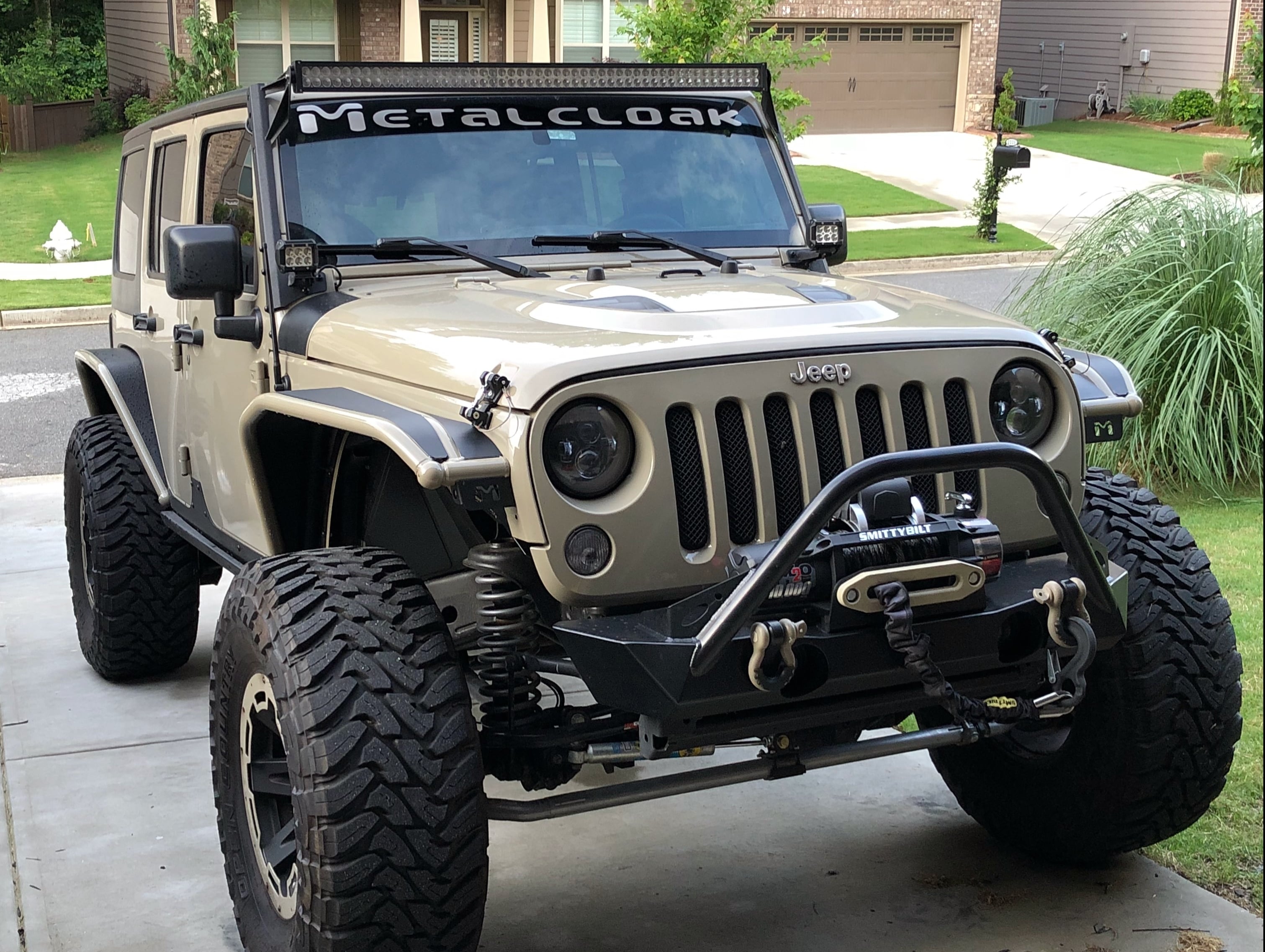 Jeep front bumper with winch mounting plate installation