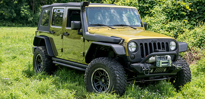 Dave D's Rescue Green Metallic 2007 Jeep Wrangler JKU | ExtremeTerrain