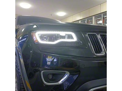 JC April LED Projector Headlights; Black Housing; Clear Lens (17-21 Jeep Grand Cherokee WK2 w/ Factory Halogen Headlights)
