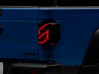 Raxiom Axial Series LED Tail Lights; Black Housing; Smoked Lens (20-25 Jeep Gladiator JT w/ Factory Halogen Tail Lights & w/o Blind Spot Detection))