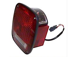Tail Light; Chrome Housing; Red/Clear Lens; Driver Side (98-06 Jeep Wrangler)