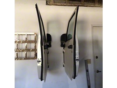 Excessive Industries Door Hangers; Pair; Bare Steel (76-06 Jeep CJ7, Wrangler YJ & TJ)