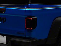 Multi-Function LED Tail Lights; Black Housing; Smoked Lens (20-26 Jeep Gladiator JT w/ Factory Halogen Tail Lights)