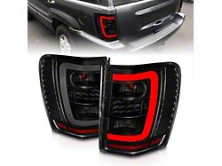 C-Bar LED Tail Lights; Black Housing; Smoked Lens (99-04 Jeep Grand Cherokee WJ)