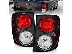Tail Lights; Black Housing; Clear Lens (99-04 Jeep Grand Cherokee WJ)