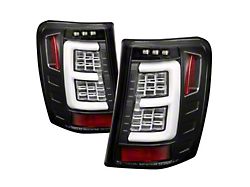 Version 3 Light Bar LED Tail Lights; Black Housing; Clear Lens (99-04 Jeep Grand Cherokee WJ)