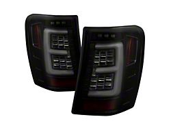 Version 3 Light Bar LED Tail Lights; Black Housing; Smoked Lens (99-04 Jeep Grand Cherokee WJ)