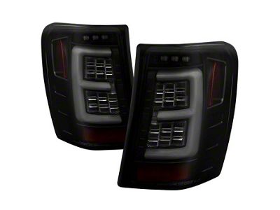 Version 3 Light Bar LED Tail Lights; Black Housing; Smoked Lens (99-04 Jeep Grand Cherokee WJ)