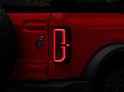Raxiom LED Tail Lights; Black Housing; Clear Lens (21-26 Bronco w/ Factory Halogen Tail Lights)