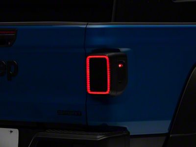 Raxiom LED Tail Lights; Black Housing; Smoked Lens (20-25 Jeep Gladiator JT w/ Factory Halogen Tail Lights & w/o Blind Spot Detection))