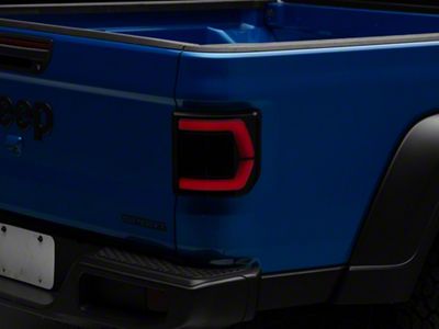 Raxiom Low Profile LED Tail Lights; Black Housing; Smoked Lens (20-25 Jeep Gladiator JT w/ Factory Halogen Tail Lights & w/o Blind Spot Detection))