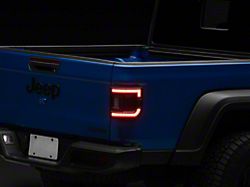 Raxiom Super Slim LED Tail Lights; Black Housing; Clear Lens (20-26 Jeep Gladiator JT w/ Factory Halogen Tail Lights)