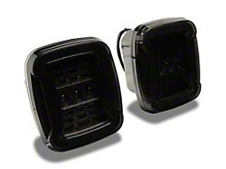 Raxiom LED Tail Lights; Black Housing; Smoked Lens (87-06 Jeep Wrangler YJ & TJ)