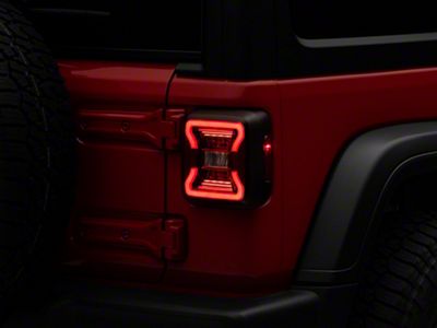 Raxiom LED Tail Lights; Black Housing; Red Lens (18-25 Jeep Wrangler JL w/ Factory Halogen Tail Lights & w/o Blind Spot Detection)