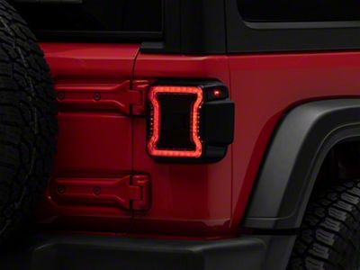Raxiom LED Tail Lights; Red Housing; Smoked Lens (18-25 Jeep Wrangler JL w/ Factory Halogen Tail Lights & w/o Blind Spot Detection)