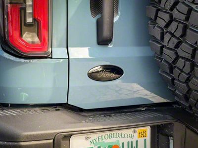 StickerFab Rear Oval Emblem Overlay; Dark Smoke (21-25 Bronco Sport)