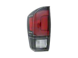 CAPA Replacement Tail Light; Black Housing; Red/Clear Lens; Driver Side (16-23 Tacoma w/ Factory LED Tail Lights)